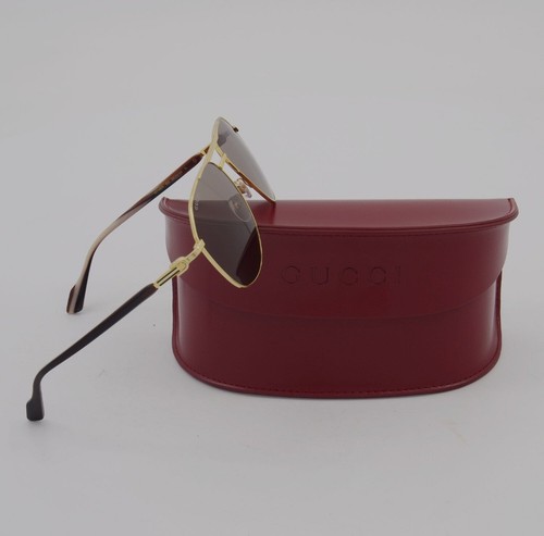 Gucci gold gg1220s sunglasses - gold,